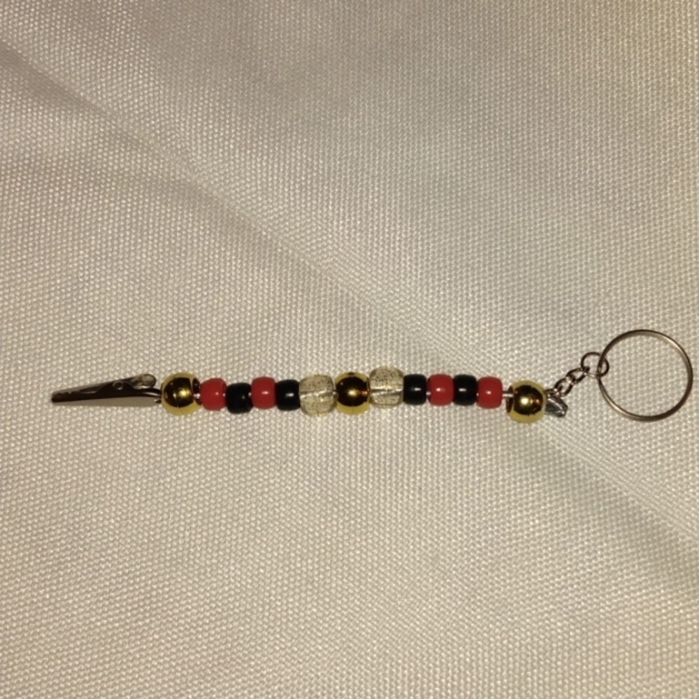 Red, black and gold roach clip keychain
